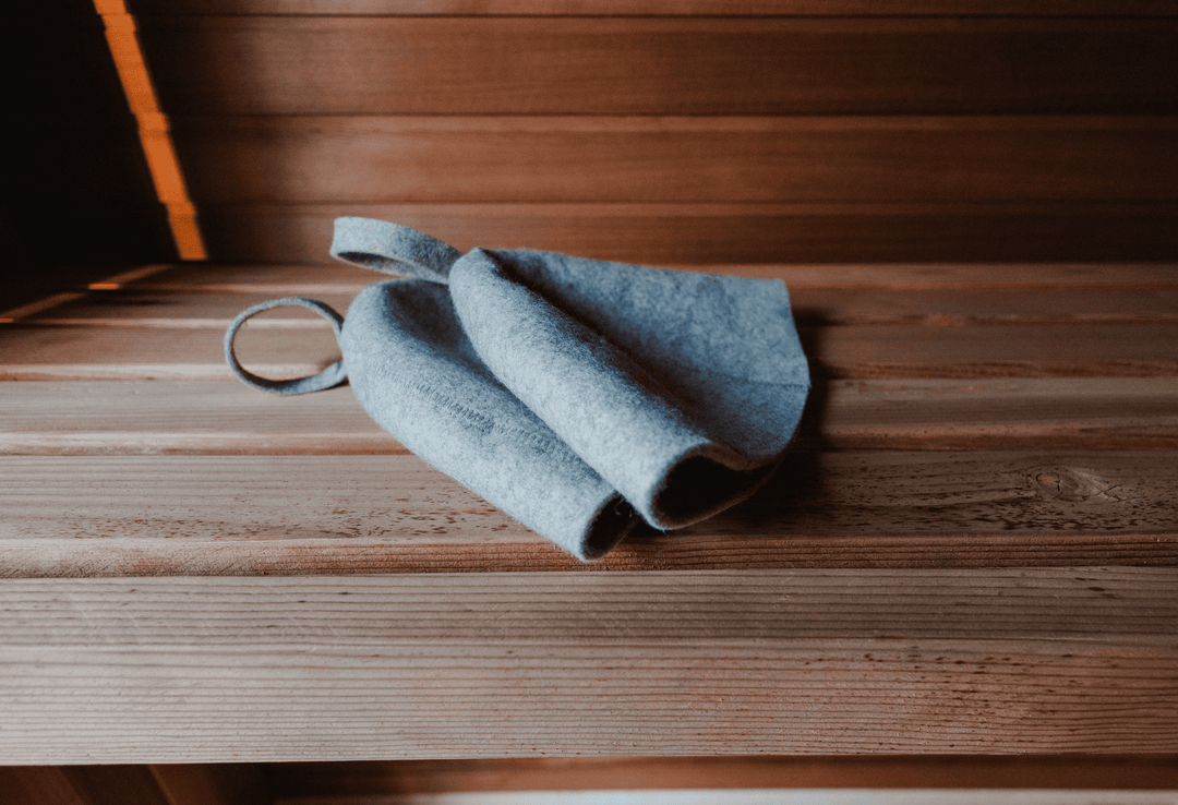 two grey sauna hat accessories on the bench by peak sauna and ice in melbourne