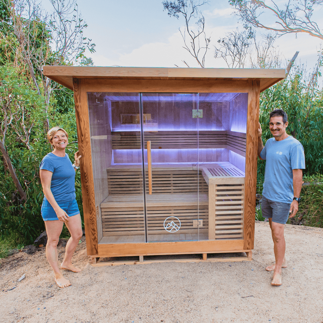 man and woman standing next to macedon sauna by peak sauna and ice in melbourne