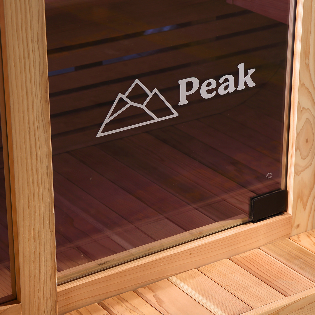 Peak logo detail on the Stirling Glass Outdoor Traditional Sauna